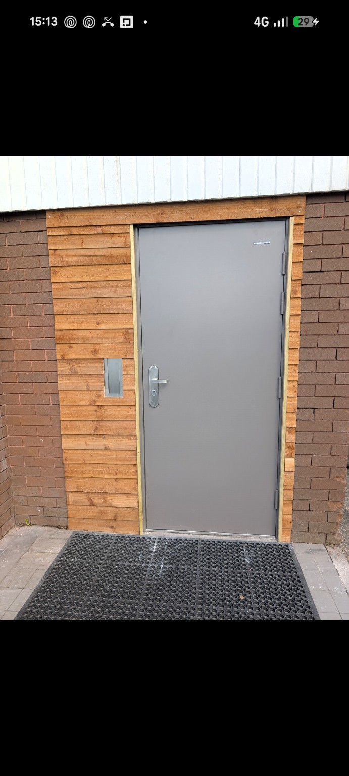 Timber cladding and external door building work